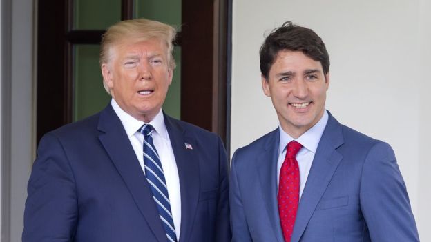 US President Donald J. Trump (L) greets Canadian Prime Minister Justin Trudeau (R) to the White House